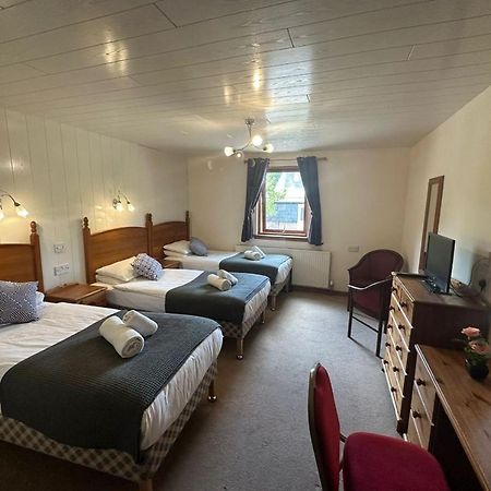 Oyo Mackay'S Travel Lodge Hotel Strathpeffer Exterior foto